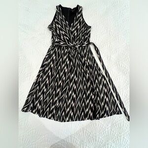 Sleeveless wrap midi dress.